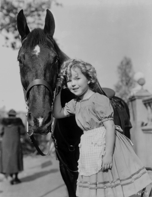 Shirley Temple with a horse in dress Photo Print - Item # VARCEL708568