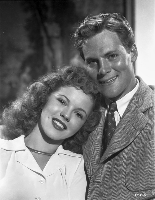 Shirley Temple smiling in Whtie Dress Photo Print - Item # VARCEL708595