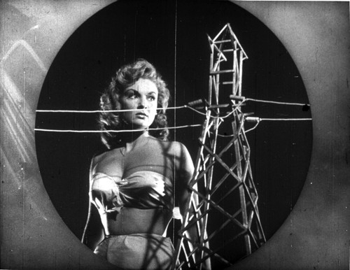 A publicity still of Alison Hayes next to a power pylon Photo Print - Item # VARCEL708812