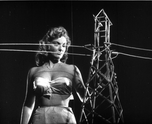 A publicity still of Alison Hayes next to a power pylon Photo Print - Item # VARCEL708814