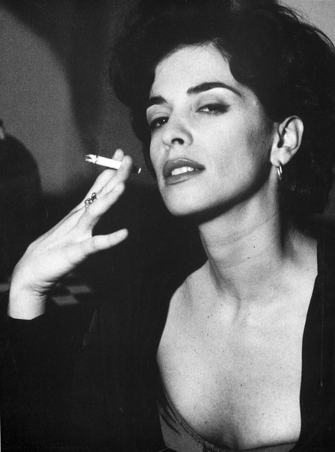 A Portrait Of Annabella Sciorra Smoking A Cigarette Photo Print - Item # VARCEL708892
