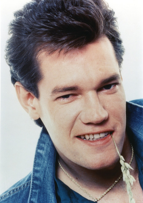 Randy Travis smiling in Close Up Portrait wearing Blue Denim Jacket Photo Print - Item # VARCEL708937