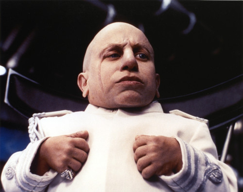 Verne Troyer Posed in White Jacket Photo Print - Item # VARCEL708954