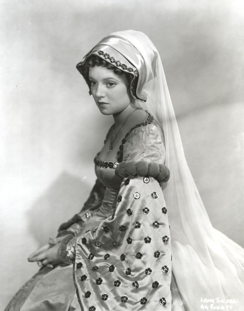 Black and White Portrait of Lana Turner sitting in Old Irish Dress Photo Print - Item # VARCEL709017