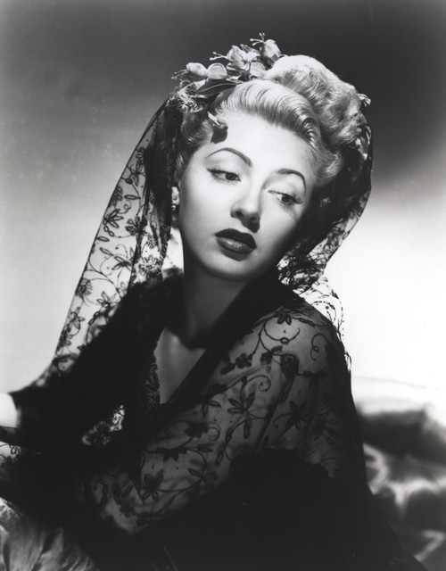 Lana Turner posed in Embroider Black Dress Photo Print - Item # VARCEL709036