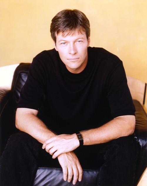Jack Wagner sitting on a Couch in Black Shirt Photo Print - Item # VARCEL709152