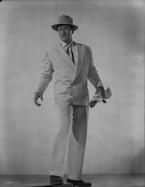 John Wayne wearing a White Suit and Pants Photo Print - Item # VARCEL709250