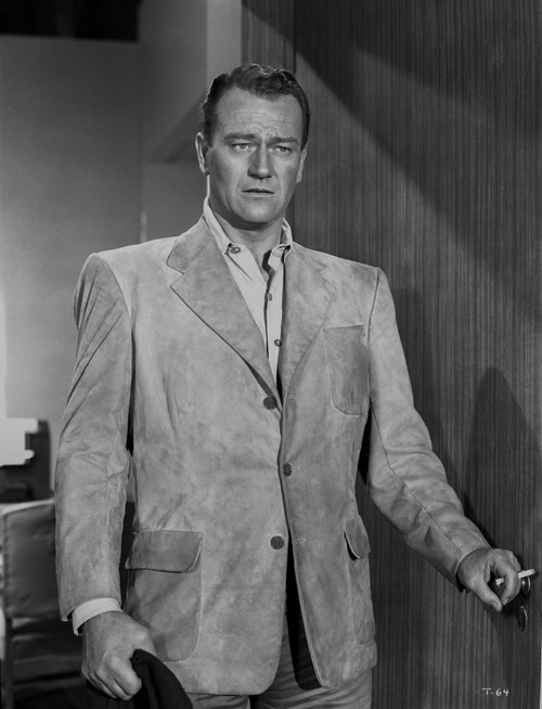 John Wayne in suit coat Photo Print - Item # VARCEL709232