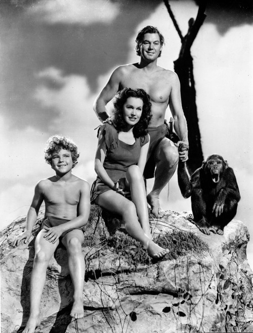 Johnny Weissmuller smiling in Black and White with a Monkey Photo Print - Item # VARCEL709303