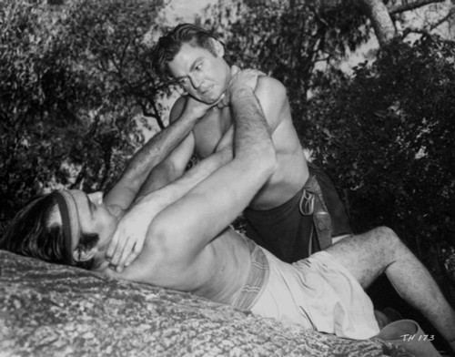 Johnny Weissmuller Choking a Man in a Movie Scene Photo Print - Item # VARCEL709346