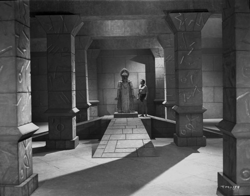 Johnny Weissmuller Talking to a Mysterious Person in a Movie Scene Photo Print - Item # VARCEL709324