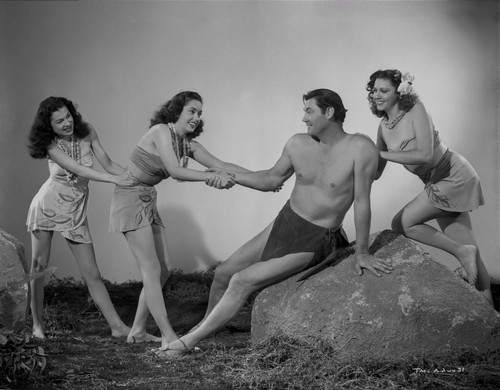Johnny Weissmuller Grabbed by a Woman in Black and White Photo Print - Item # VARCEL709326