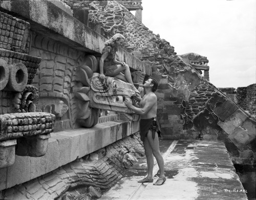 Johnny Weissmuller Talking to a Woman on Top of the Dragon Head Wall Decoration in a Classic Movie Scene Photo Print - Item # VARCEL709333