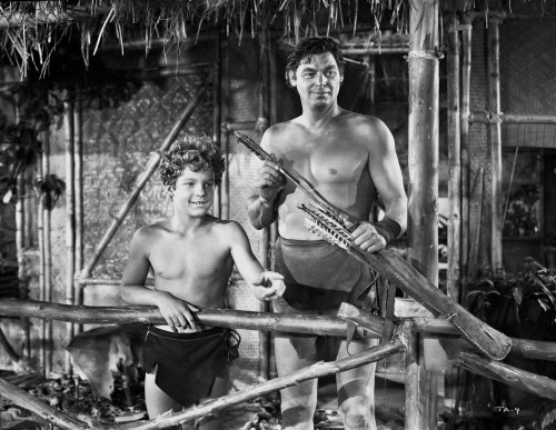 Johnny Weissmuller Holding a Weapon in a Classic Movie Scene Photo Print - Item # VARCEL709388