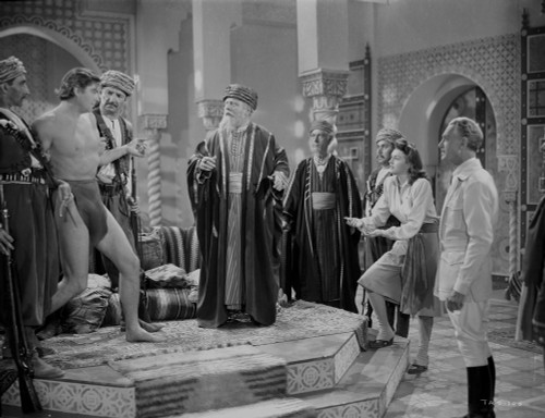 Johnny Weissmuller Being Arrested By a Bunch of Guy in a Classic Movie Scene Photo Print - Item # VARCEL709390