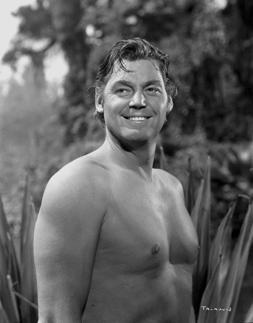 Johnny Weissmuller Showing His Smile in a Classic Movie Scene Photo Print - Item # VARCEL709379