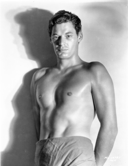 Johnny Weissmuller standing in a Portrait Photo Print - Item # VARCEL709434