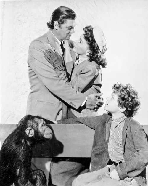 Johnny Weissmuller hugging His Wife in a Classic Movie Scene Photo Print - Item # VARCEL709437