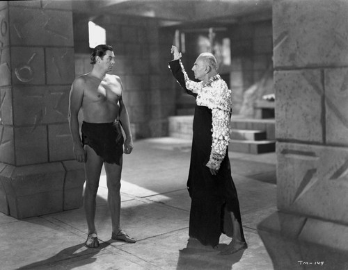 Johnny Weissmuller Listening to an Old Guy in a Classic Movie Scene Photo Print - Item # VARCEL709425