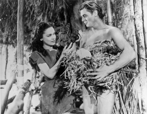 Johnny Weissmuller Holding a Birds Nests in a Classic Movie Scene Photo Print - Item # VARCEL709460
