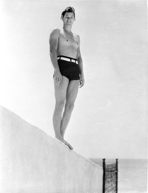 Johnny Weissmuller standing on Top of a Diving Board Photo Print - Item # VARCEL709468