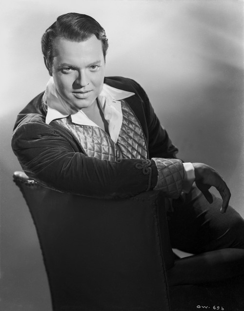 Orson Welles sitting in Black and White Photo Print - Item # VARCEL709537