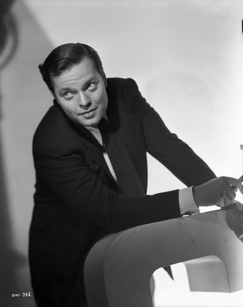 Orson Welles Seated smiling in Classic Photo Print - Item # VARCEL709535