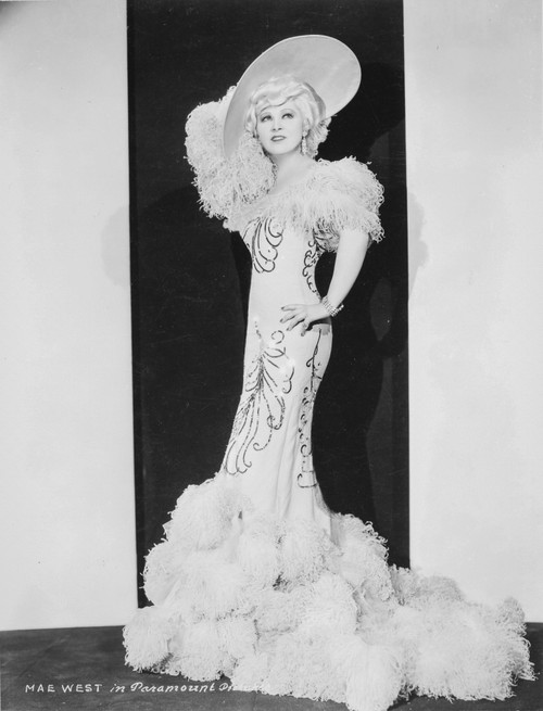 Mae West Posed in Elegant Long Gown with Fur at the End Photo Print - Item # VARCEL709658