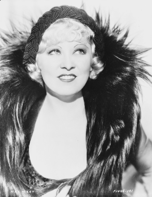 Mae West smiling in Feather Dress with Black Headband Photo Print - Item # VARCEL709648