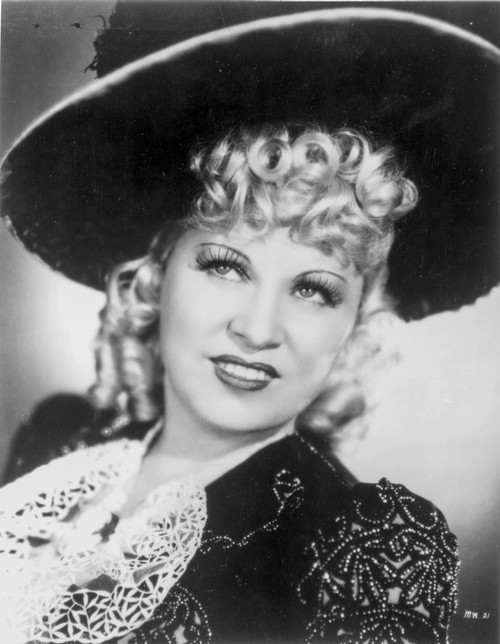 Mae West smiling in Glamorous Dress with Hat Photo Print - Item # VARCEL709710