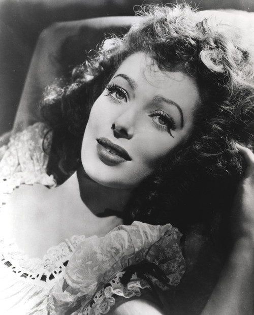 Loretta Young Portrait Lying with Curly Hair Photo Print - Item # VARCEL710022