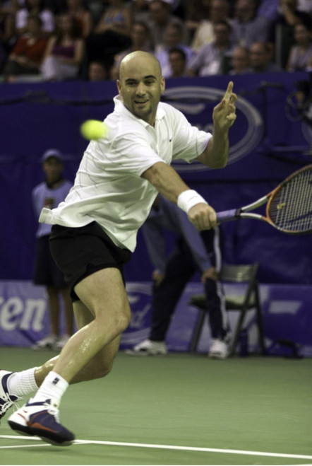 Andre Agassi playing tennis Photo Print (8 x 10)