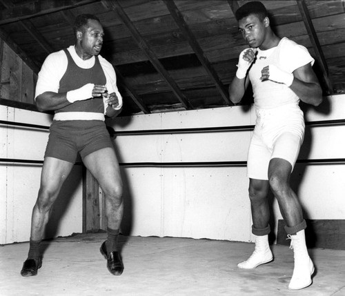 Muhammad Ali training with Archie Moore Photo Print - Item # VARGLP347890