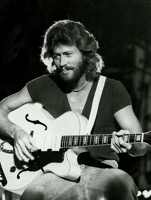 Barry Gibb playing the guitar Photo Print