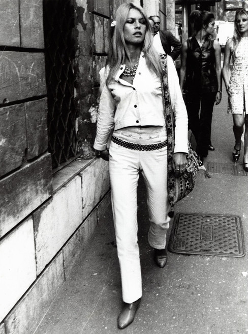 Brigitte Bardot on a sidewalk Photo Print (8 x 10)