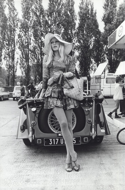 Brigitte Bardot by a car Photo Print (8 x 10)