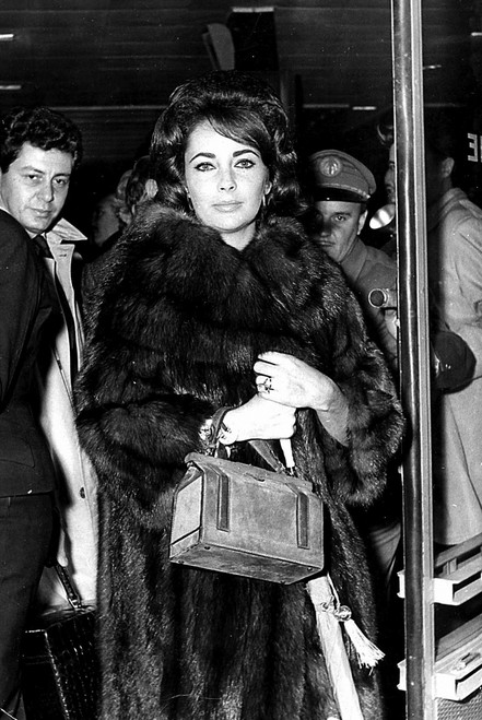 Elizabeth Taylor wearing a fur coat Photo Print - Item # VARGLP354218