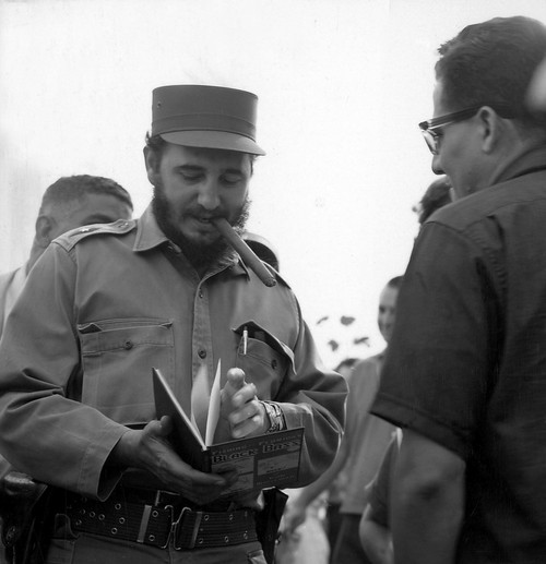Fidel Castro smoking a cigar Photo Print - Item # VARGLP356057