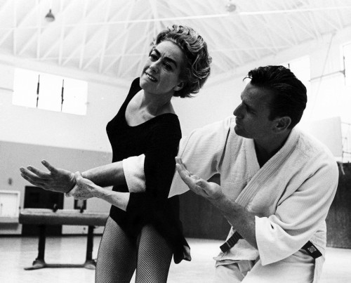 Joan Crawford on the set of The Caretakers Photo Print - Item # VARGLP359836