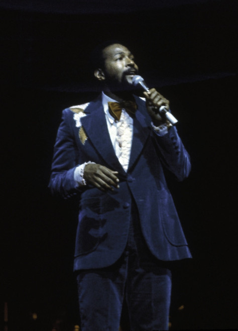 Marvin Gaye performing on stage wearing a blue suit Photo Print - Item # VARGLP360877