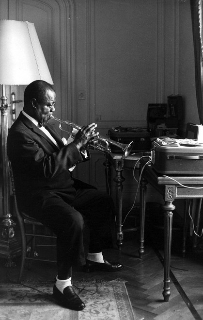Louis Armstrong playing a trumpet Photo Print - Item # VARGLP368383