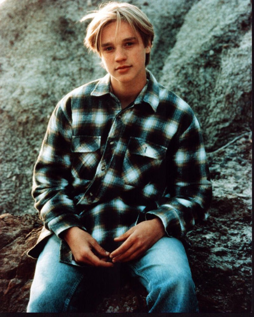Devon Sawa Sitting On Rock In Plaid Shirt Photo Print - Item # MVM01366