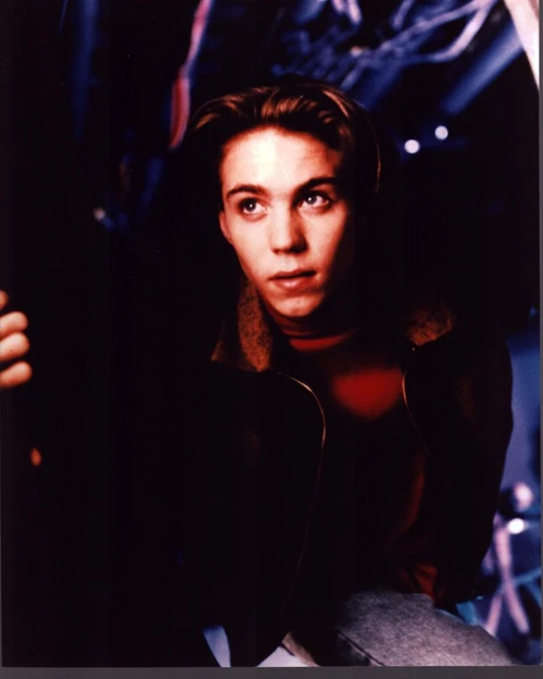 Jonathan Brandis In Red Turtleneck And Coat Photo Print