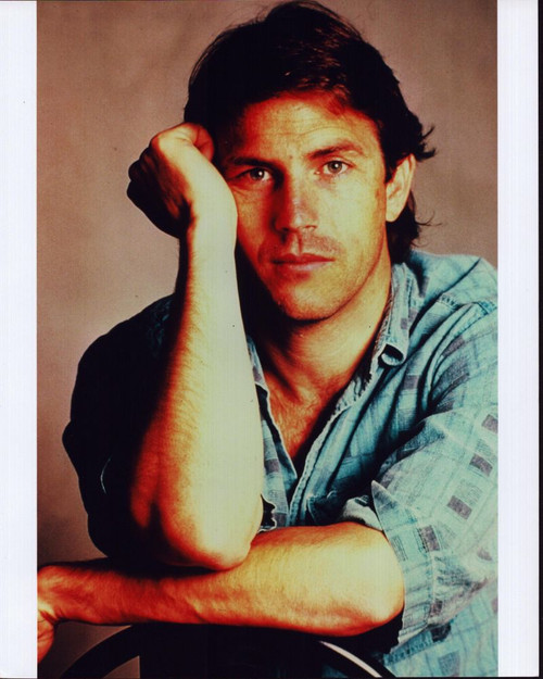 Kevin Costner Wearing Blue Plaid Shirt With Arm Up Photo Print