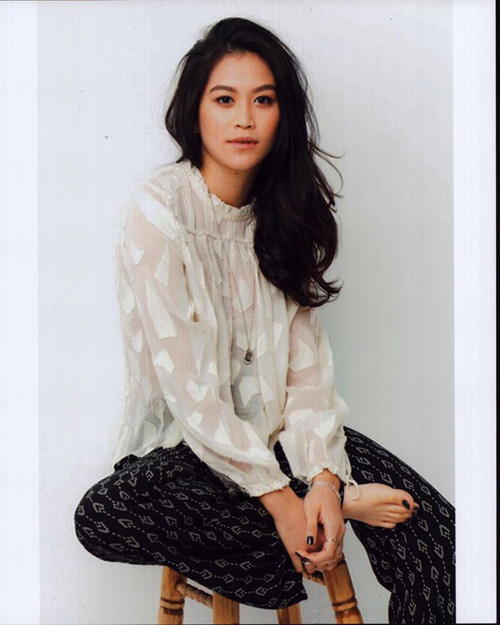 Dianne Doan In White Top And Black Patterned Pants Photo Print
