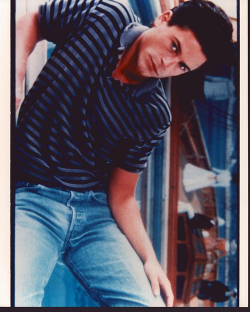 Rob Lowe Laying On Side In Striped Top And Jeans Photo Print