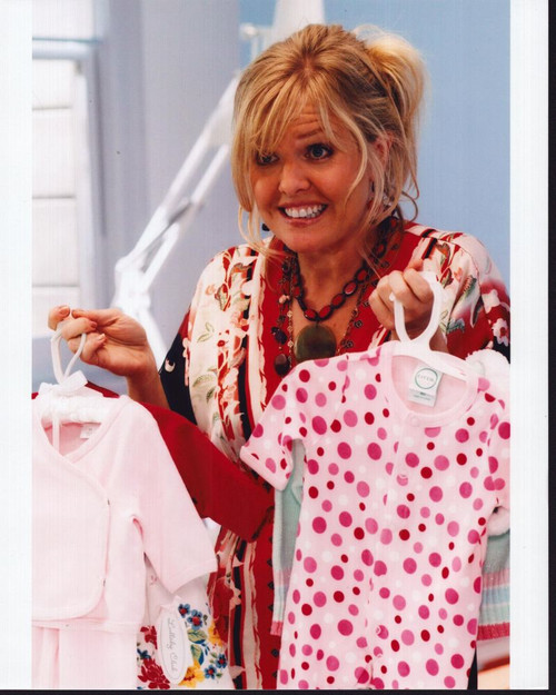 Ashley Jensen Holding Baby Clothes In Ugly Betty Photo Print