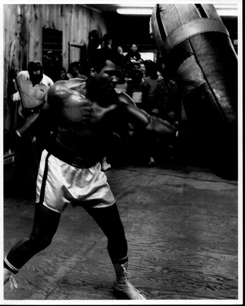 Muhammad Ali Hitting Punching Bag Black And White Photo Print