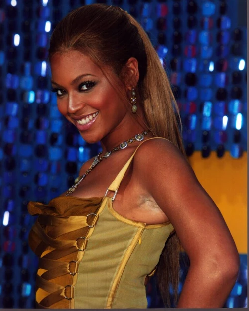 Beyonce In Gold Lace Up Top Photo Print