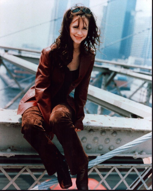 Jennifer Love Hewitt Sitting On Beam In Red Leather Jacket Photo Print